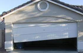 DOOR OFF TRACK-All Pro Garage Door, LLC. Commerce, MI
